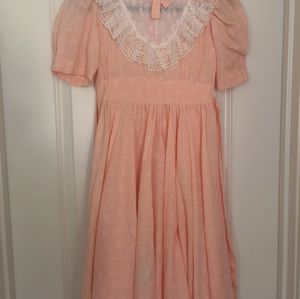 I gift it with my other dress. no brand vintage big girl dress